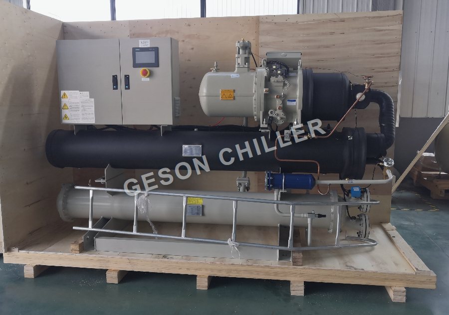 Factory photograph of a completed screw chiller secured for export packing