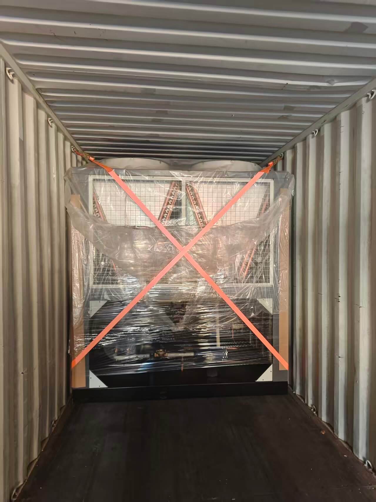 Ocean freight container loading and security bracing for industrial chiller